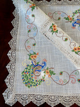 Load image into Gallery viewer, Floris Linens Peacock Embroidered Table Topper with Lace, Natural Linen Color
